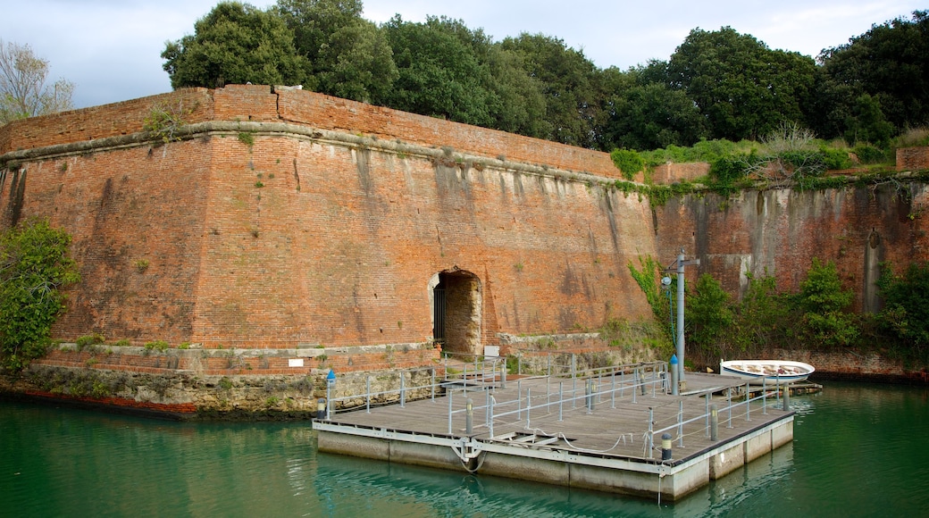 Fortezza Nuova featuring a river or creek and heritage architecture