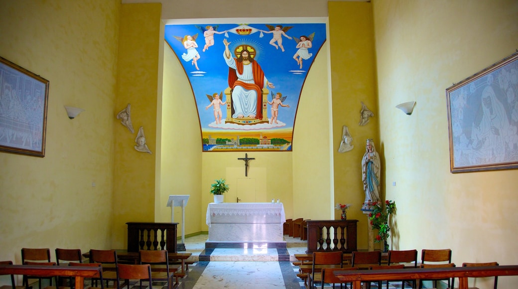 Massaciuccoli Lake showing religious elements, interior views and a church or cathedral