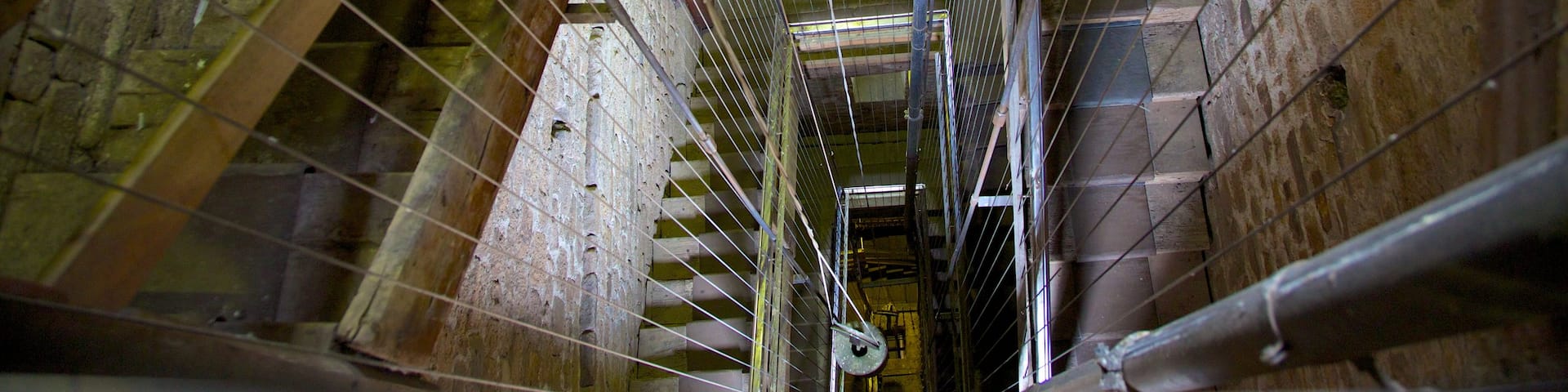 Torre delle Ore featuring heritage architecture and interior views