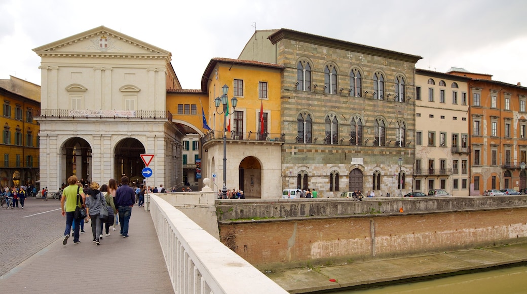 Pisa which includes heritage architecture and a city