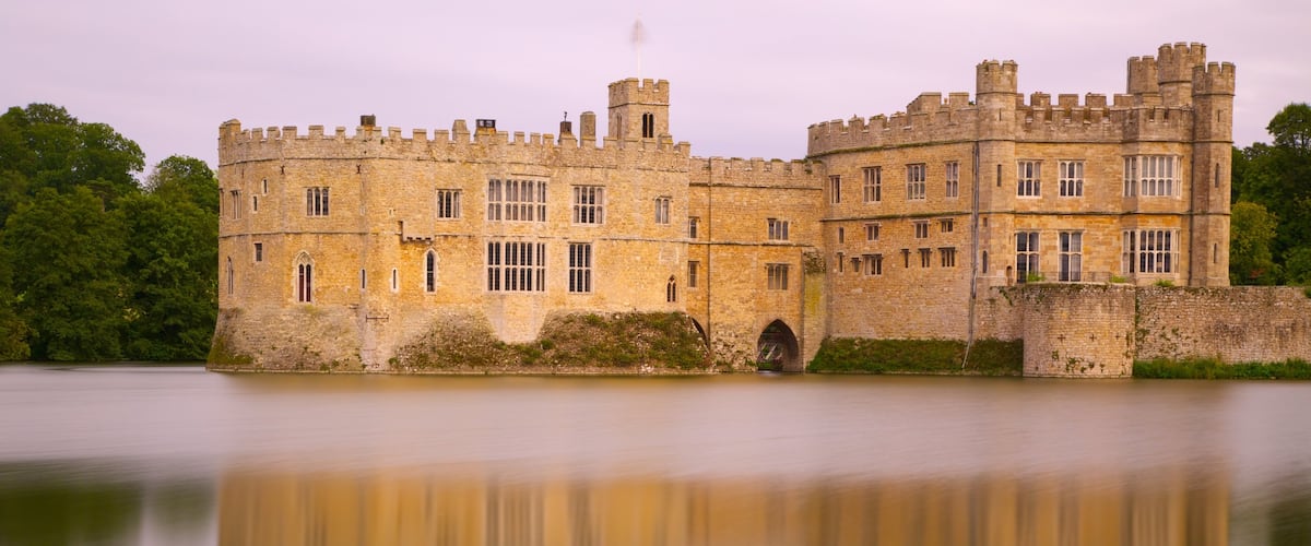 Leeds Castle which includes a river or creek, heritage architecture and heritage elements