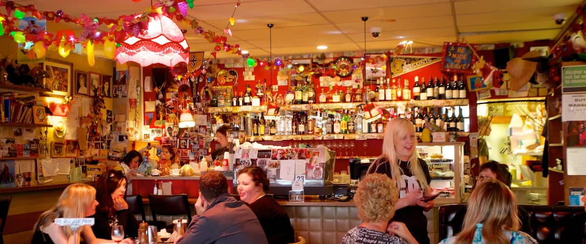 Courtenay Place featuring interior views and a bar as well as a small group of people
