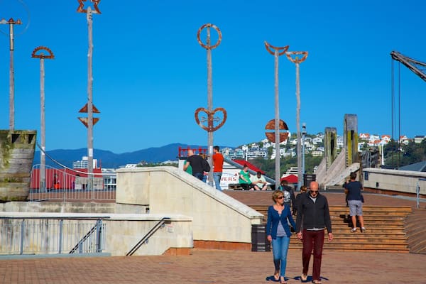 Civic Square featuring outdoor art and a square or plaza as well as a couple