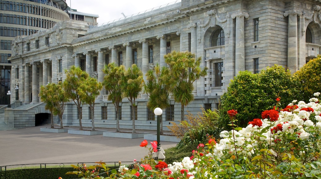 Wellington Parliament showing a square or plaza, flowers and heritage architecture