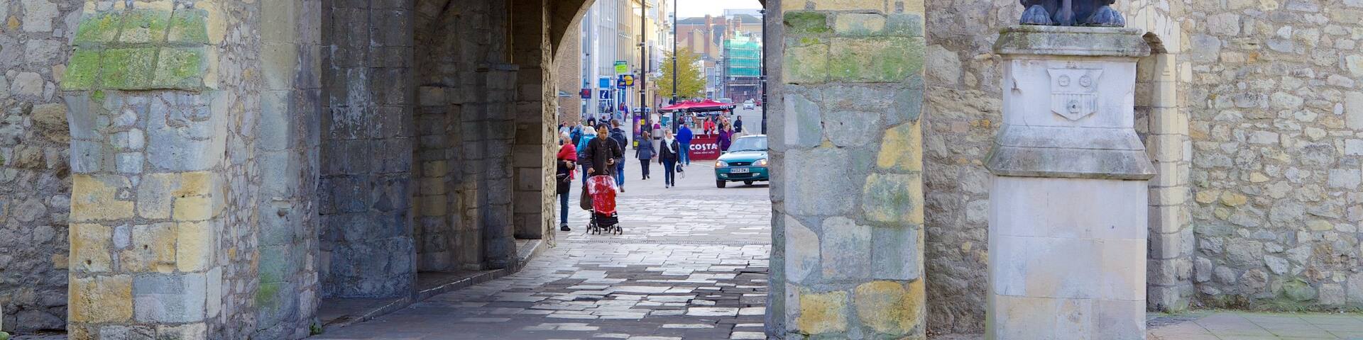 Old City Walls which includes a statue or sculpture and heritage architecture