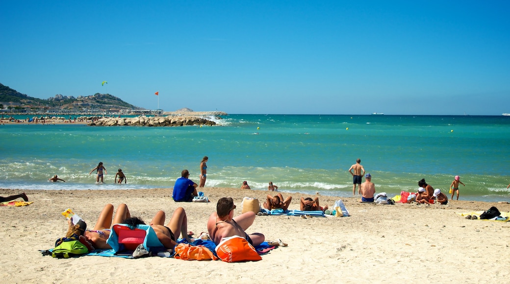 Borely Beach which includes a beach, general coastal views and swimming