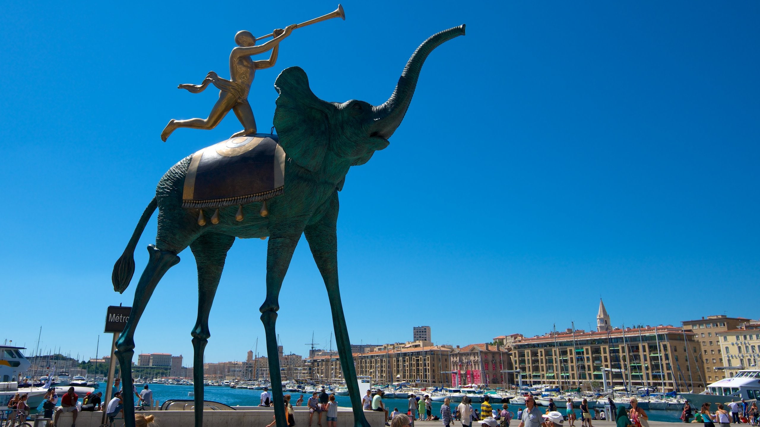 Vieux Port featuring a square or plaza, a statue or sculpture and a city