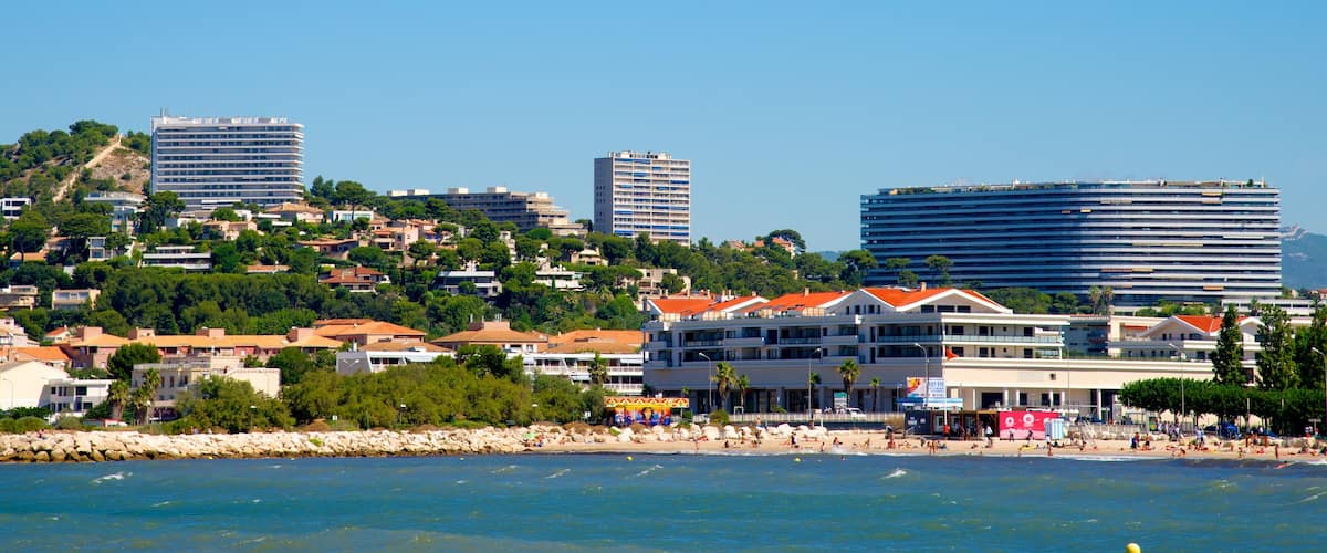 Borely Beach which includes a coastal town, general coastal views and a luxury hotel or resort