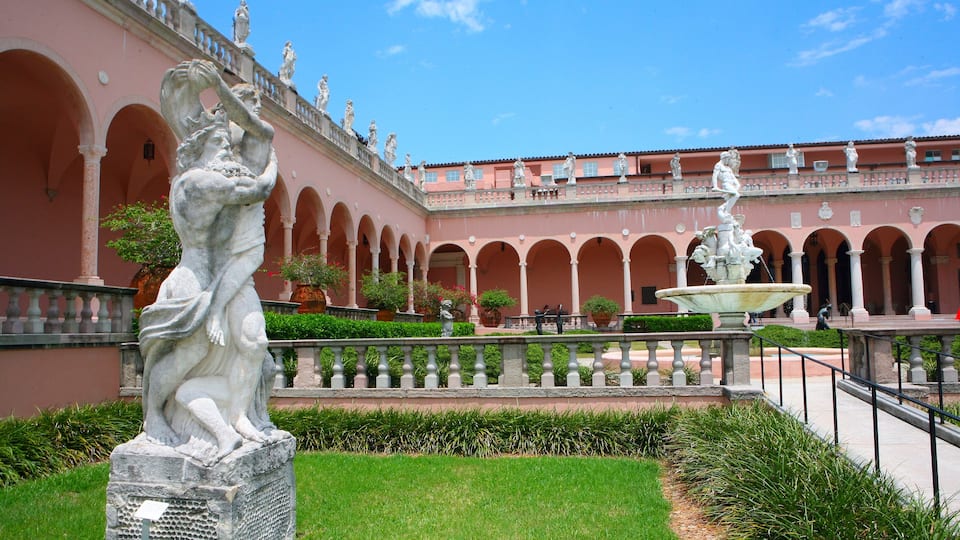 Sarasota showing a garden, heritage architecture and a statue or sculpture