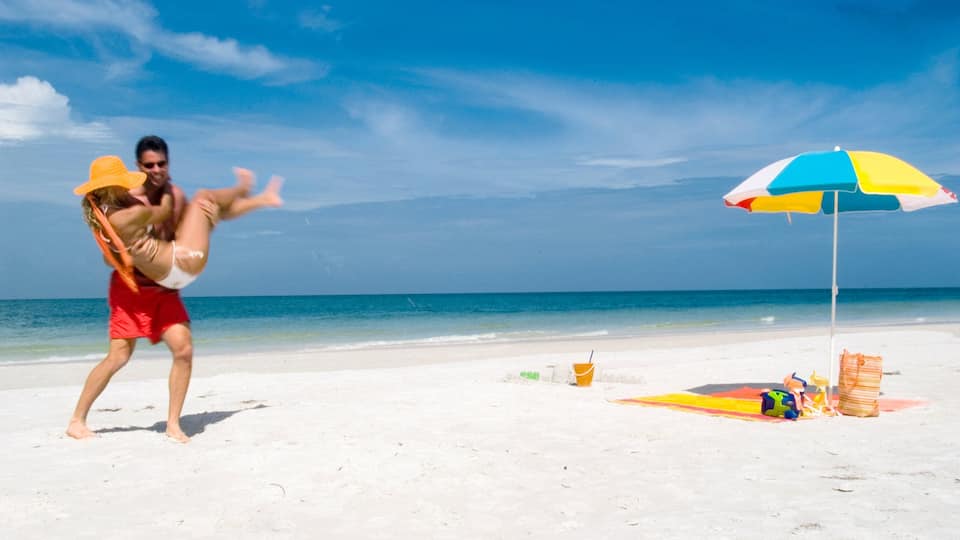 Sarasota showing a beach and general coastal views as well as a couple