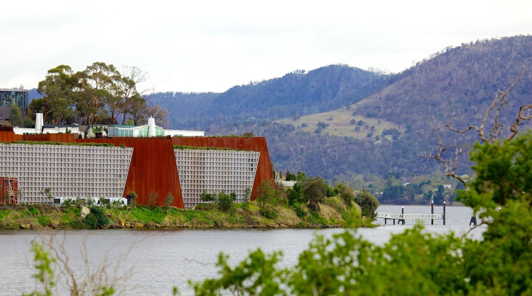 MONA which includes art, modern architecture and a river or creek