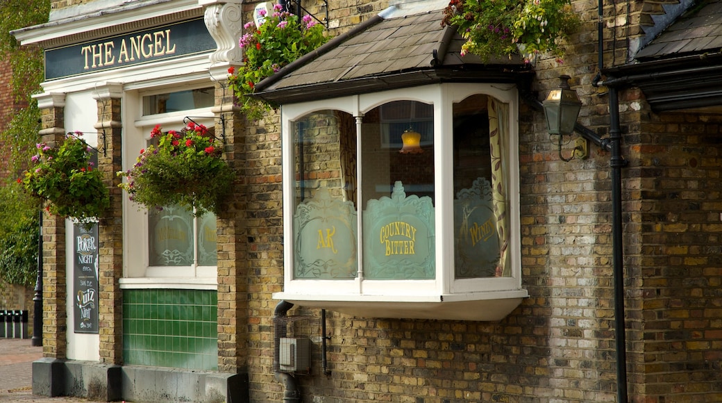 Waltham Abbey which includes signage, a city and street scenes