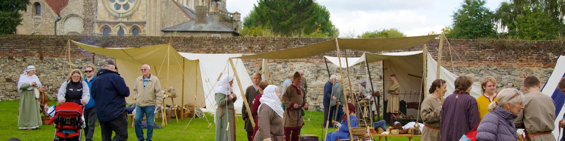 Waltham Abbey Church which includes a church or cathedral and religious elements as well as a large group of people