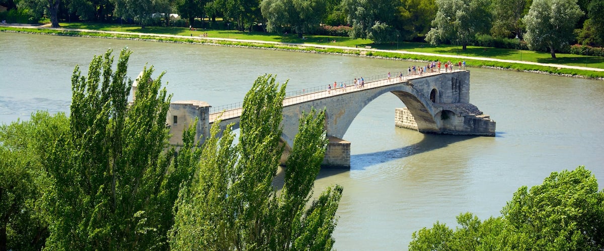 Parc des Expositions which includes a bridge, heritage architecture and a river or creek