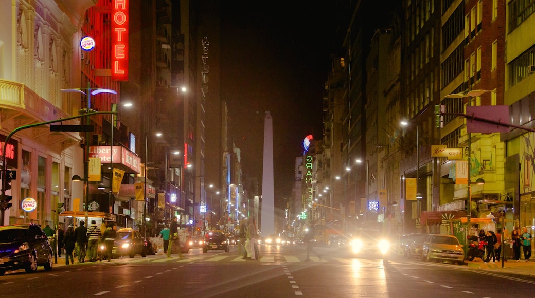 Avenida Corrientes som visar nattliv, gatuliv och affärsdistrikt