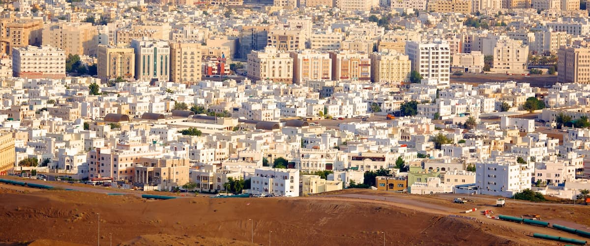 Muscat featuring a city