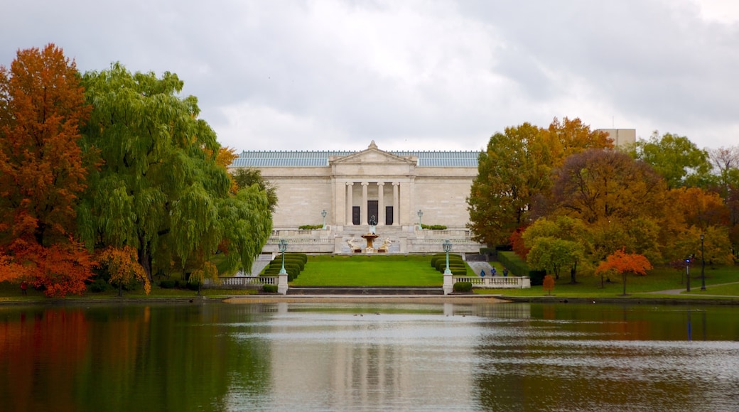 Cleveland Museum of Art showing heritage architecture, fall colors and a pond