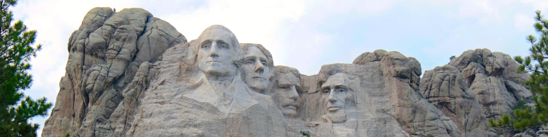 Mount Rushmore which includes mountains and a monument