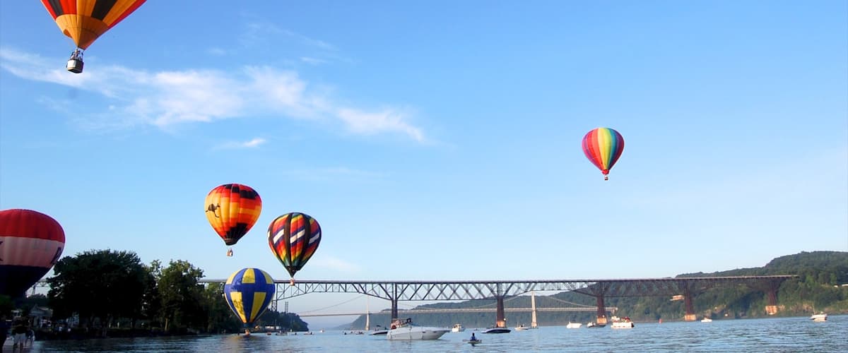 Poughkeepsie showing a river or creek, a bridge and ballooning