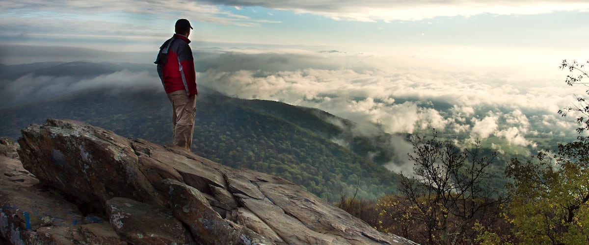 Charlottesville which includes a sunset, mist or fog and mountains