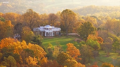 Charlottesville featuring a house, a garden and autumn colours