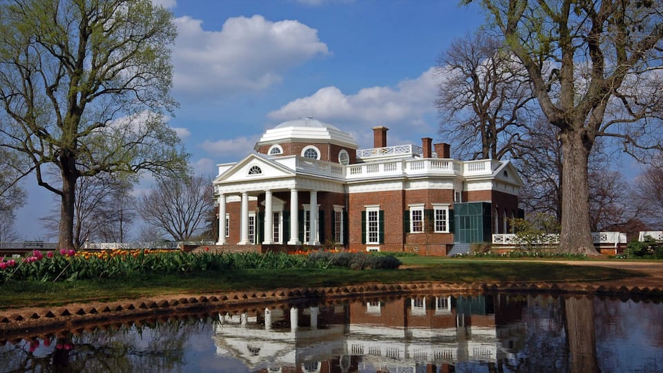 Charlottesville which includes a house, a pond and a park