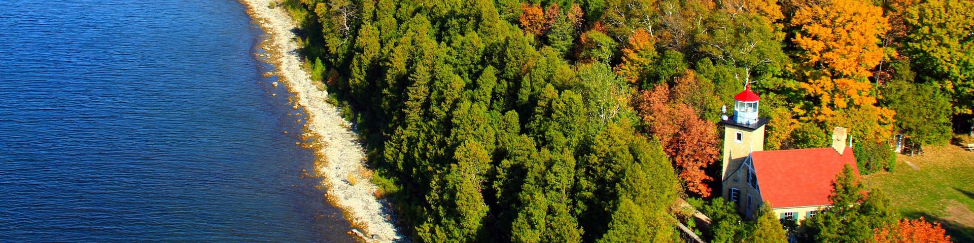 Door Peninsula which includes autumn leaves, general coastal views and forests