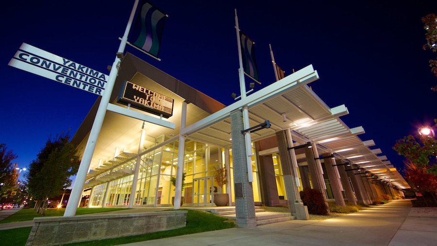 Yakima which includes night scenes, signage and modern architecture