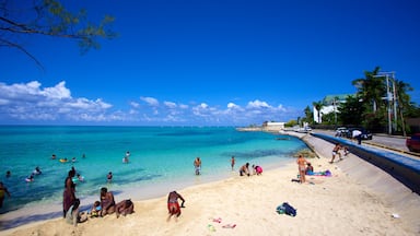 Montego Bay showing a coastal town, general coastal views and a beach