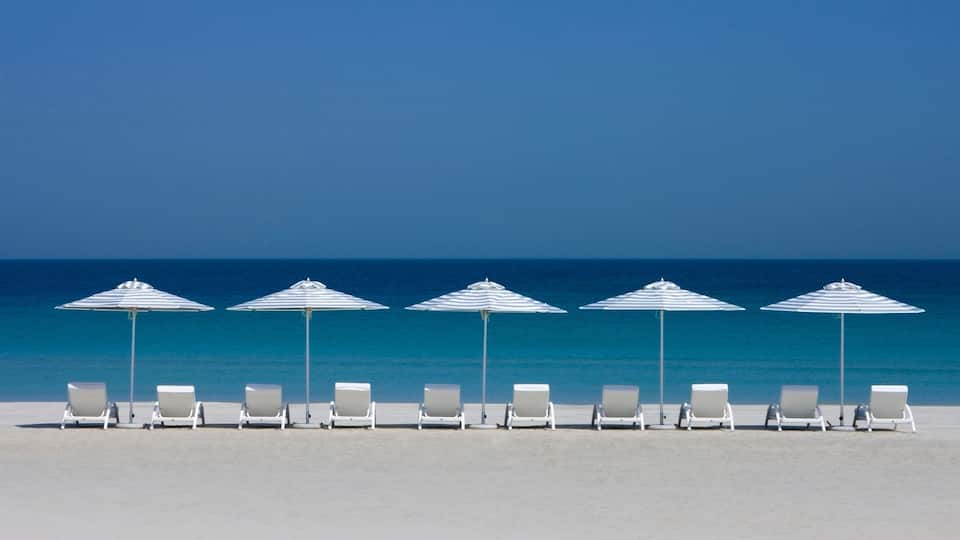 Abu Dhabi Emirate showing a sandy beach and a luxury hotel or resort