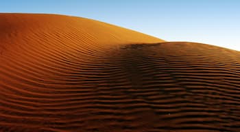 Emirato di Abu Dhabi mostrando tramonto, vista del deserto e vista del paesaggio