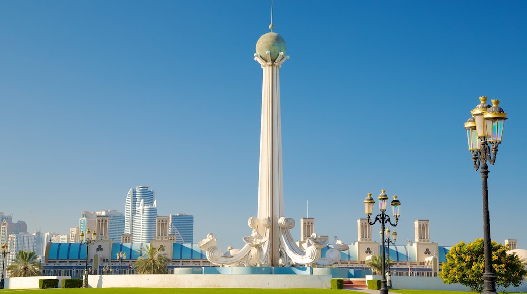 Sharjah featuring a city and a monument