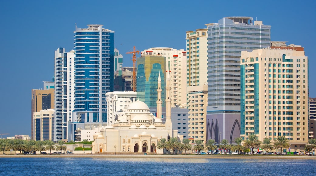 Sharjah which includes cbd and a skyscraper