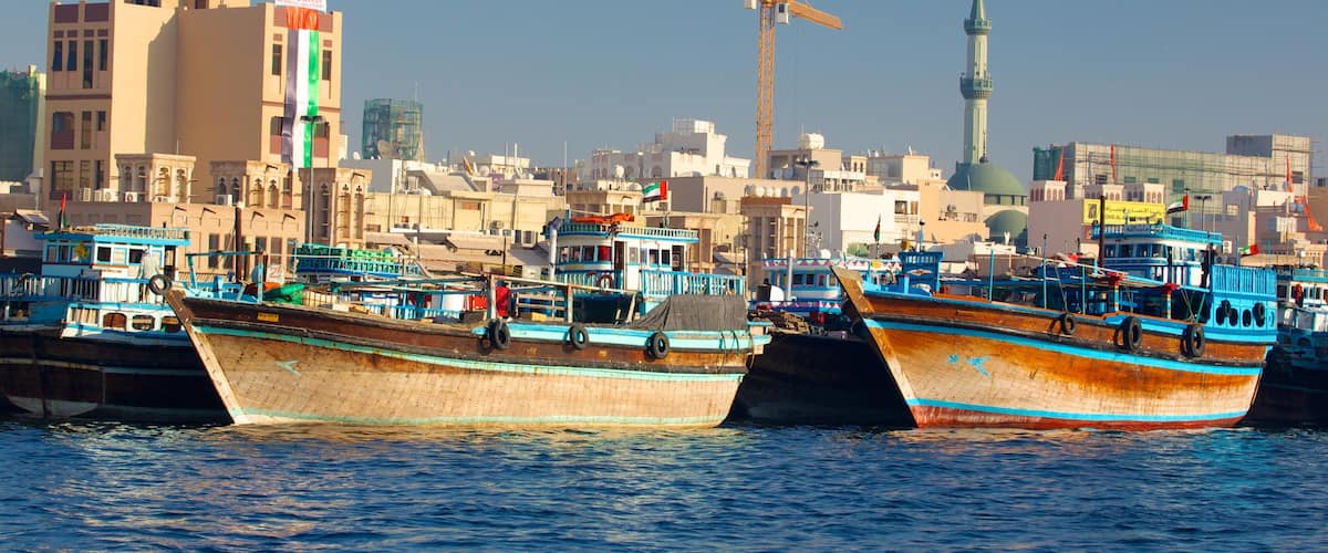 Dubai Creek featuring a marina, boating and a bay or harbour