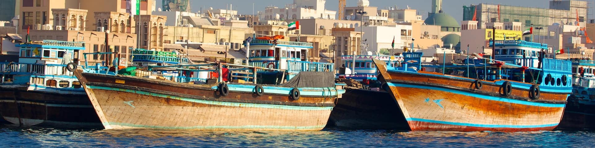 Dubai Creek featuring a marina, boating and a bay or harbour