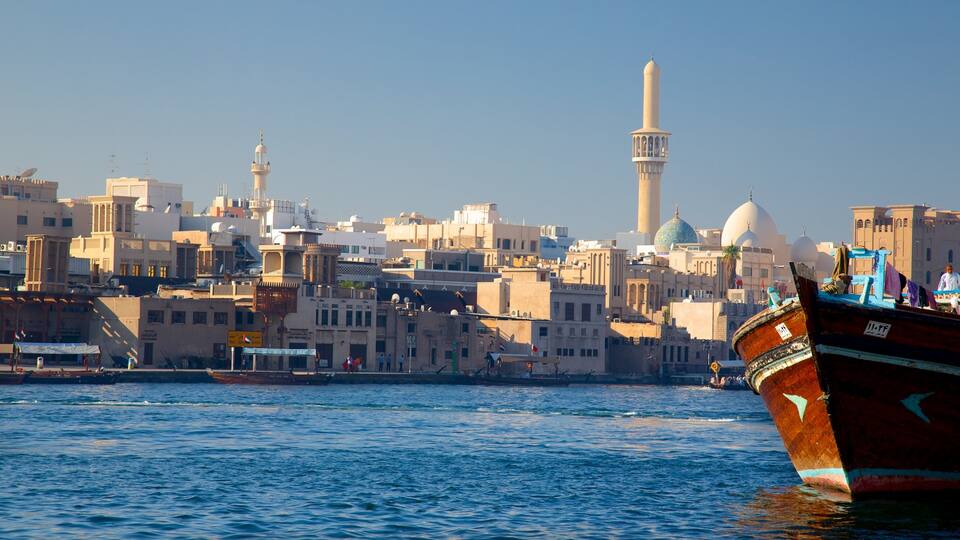 Dubai Creek which includes boating, a city and a bay or harbour