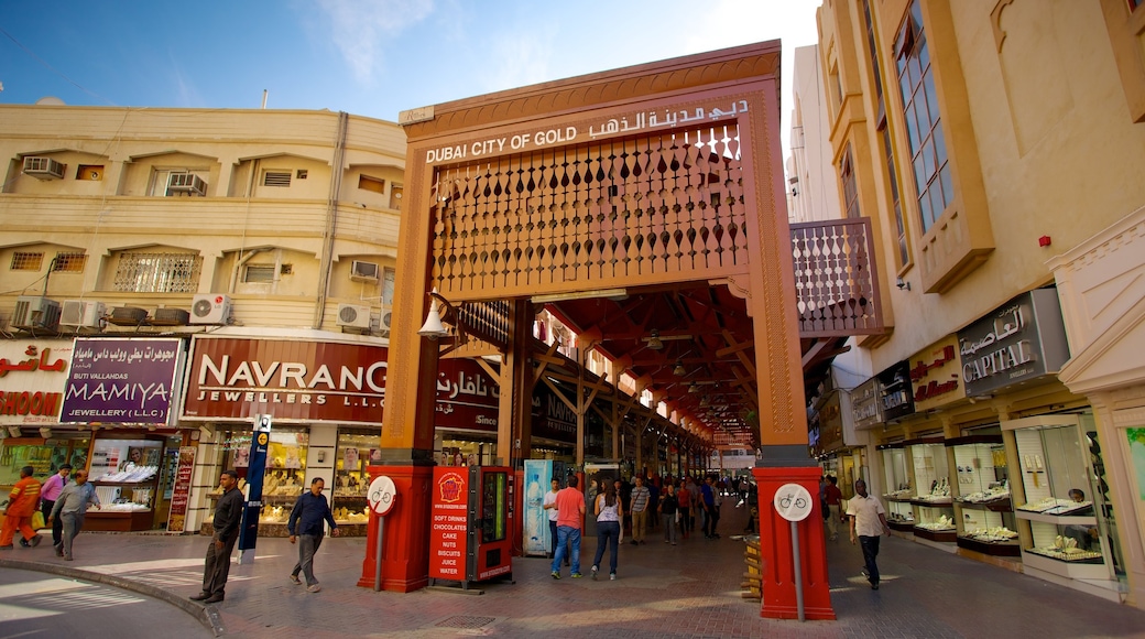 Gold Souk which includes signage, a city and central business district