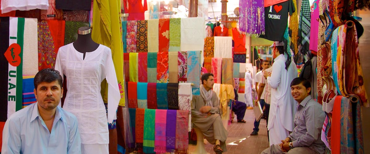 Gold Souk featuring a city, shopping and markets