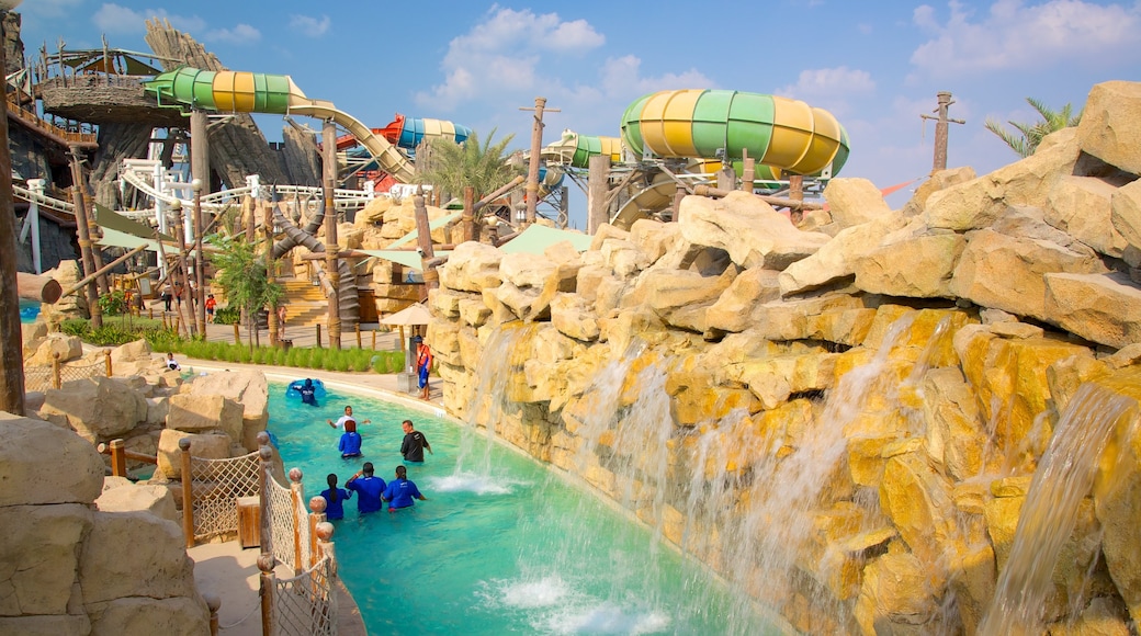 Yas Waterworld showing a water park and a pool