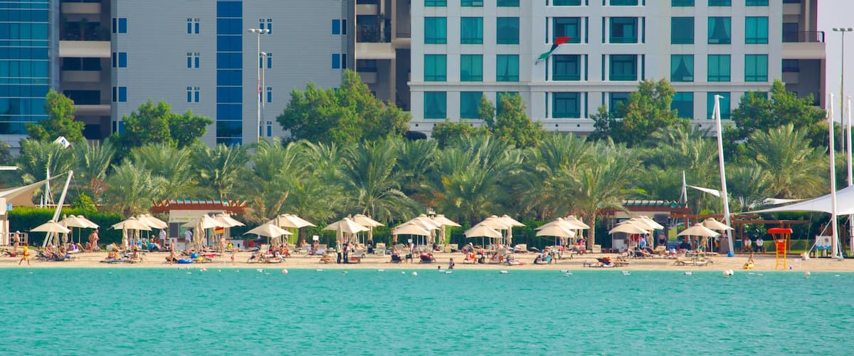 The Corniche featuring general coastal views and a sandy beach