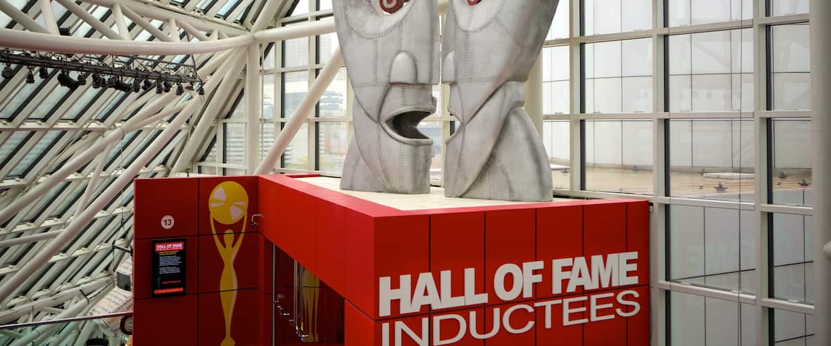 Rock and Roll Hall of Fame featuring music, interior views and signage