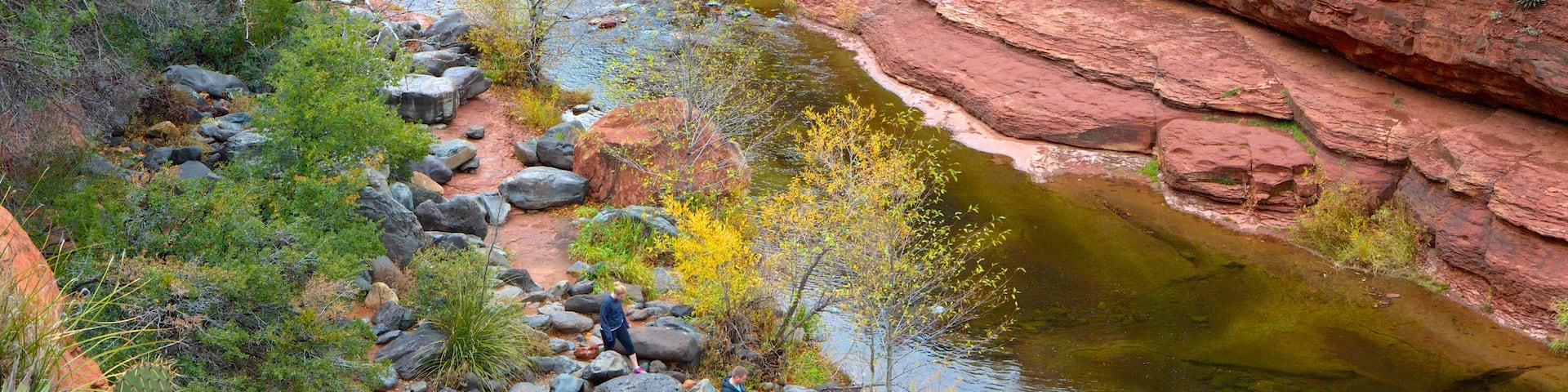 Slide Rock State Park showing a river or creek and a gorge or canyon