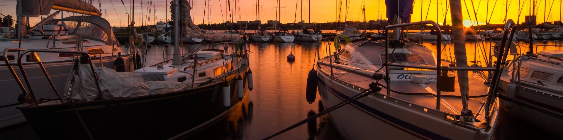 Vaasa showing a sunset and a marina