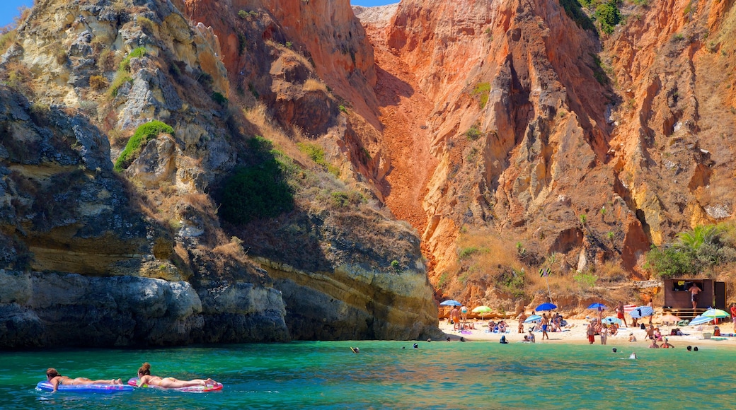 Lagos featuring rocky coastline, a gorge or canyon and a beach