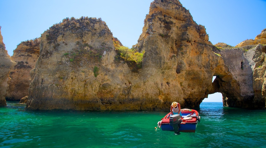 Lagos showing a gorge or canyon, boating and general coastal views