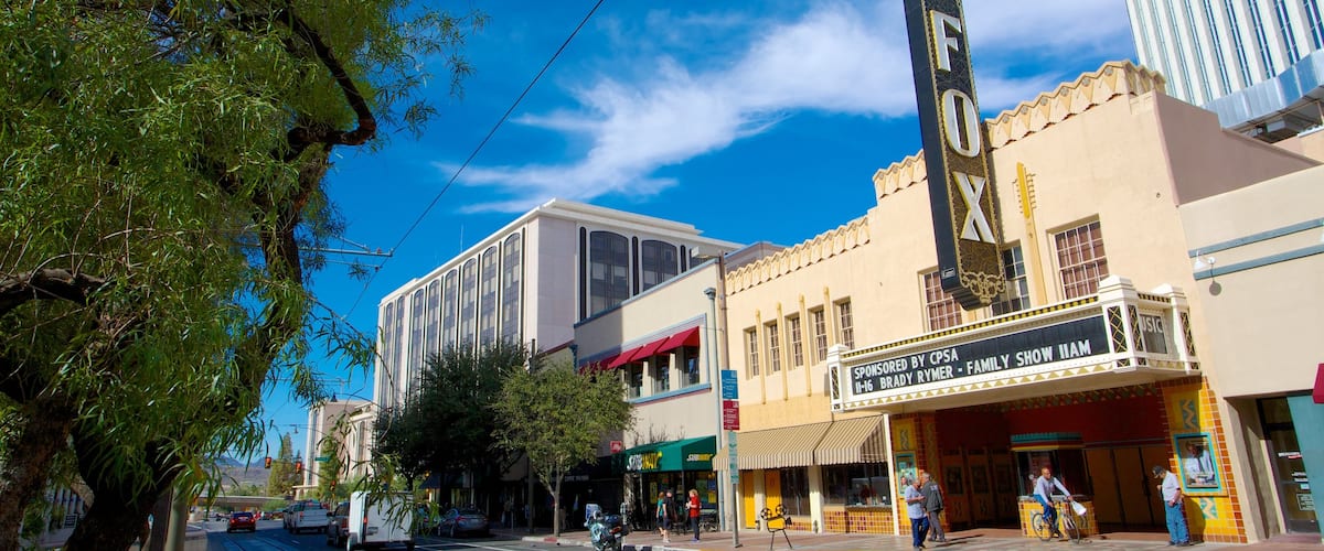 Fox Theatre featuring signage, heritage elements and theater scenes