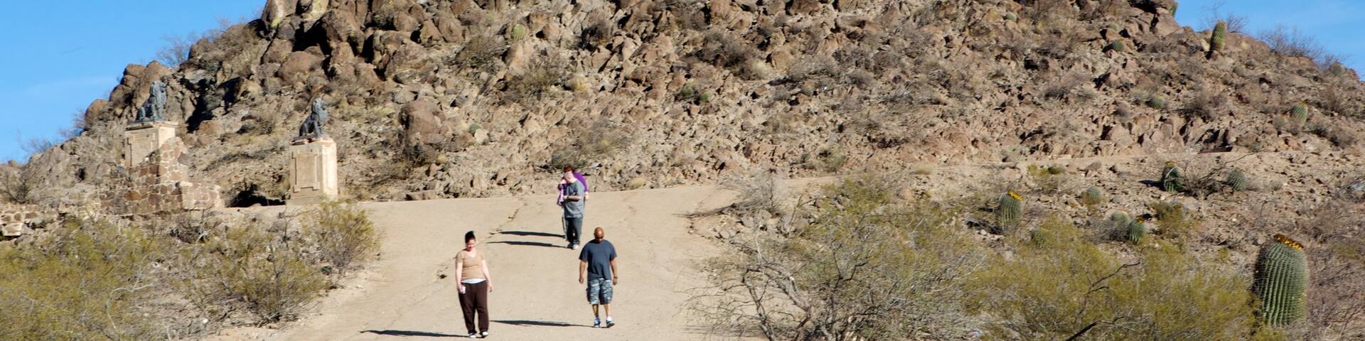 Mission San Xavier del Bac featuring religious aspects, hiking or walking and desert views