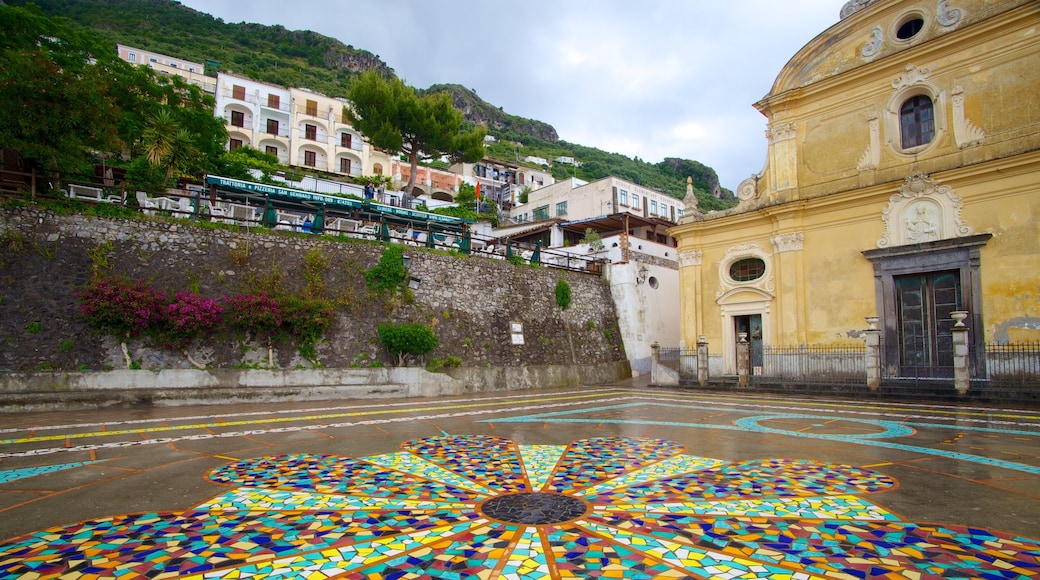 Amalfi Coast which includes heritage elements, outdoor art and a square or plaza