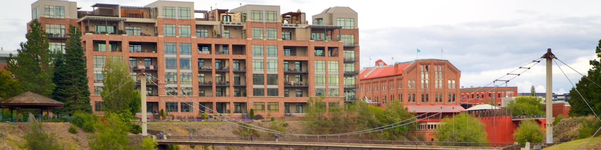 Spokane showing a city, a suspension bridge or treetop walkway and rapids
