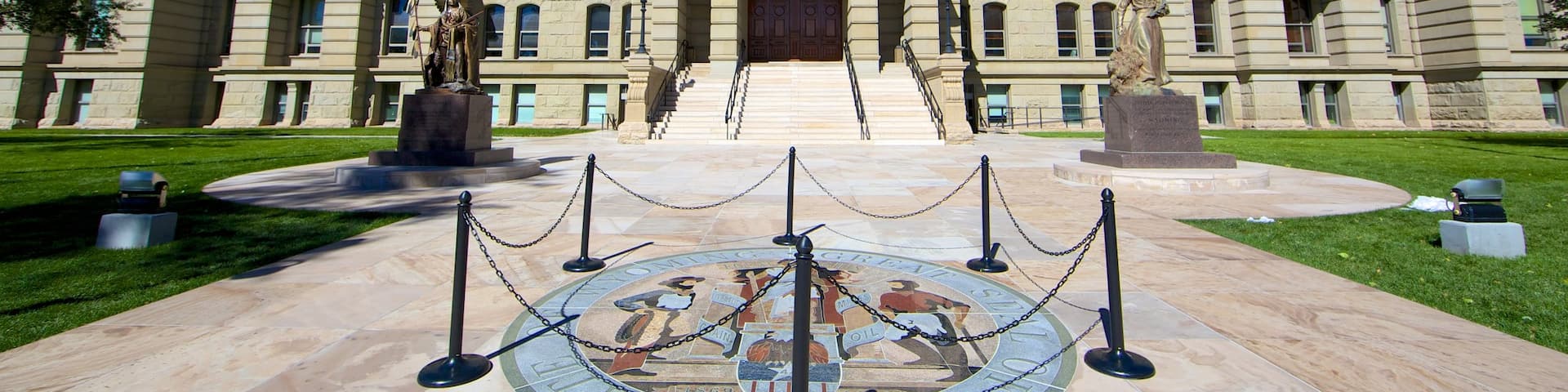 Cheyenne showing a statue or sculpture, an administrative buidling and a square or plaza